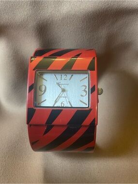 Geneva Red and Black Striped Wide Cuff Watch with Gold Accents. Needs battery